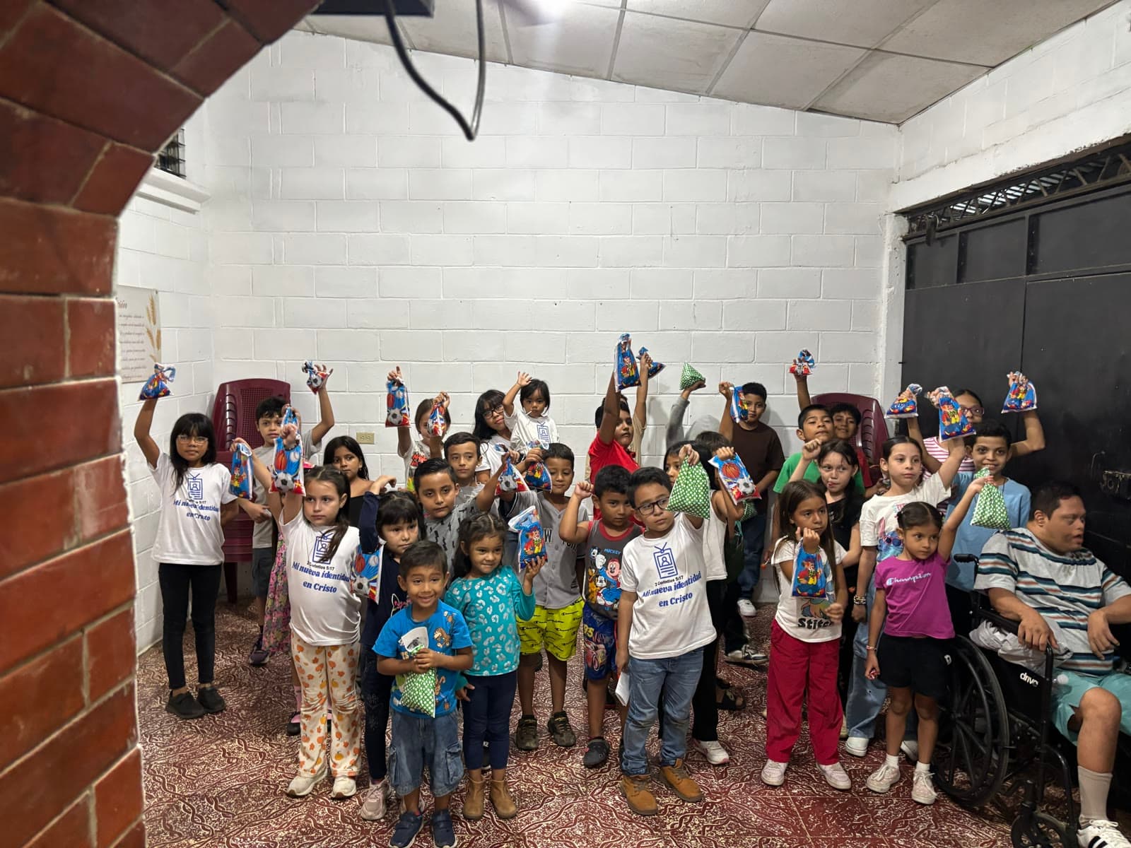 Handing out candy to the children